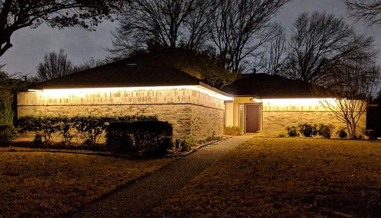 Concealed linear lighting along a modern roofline